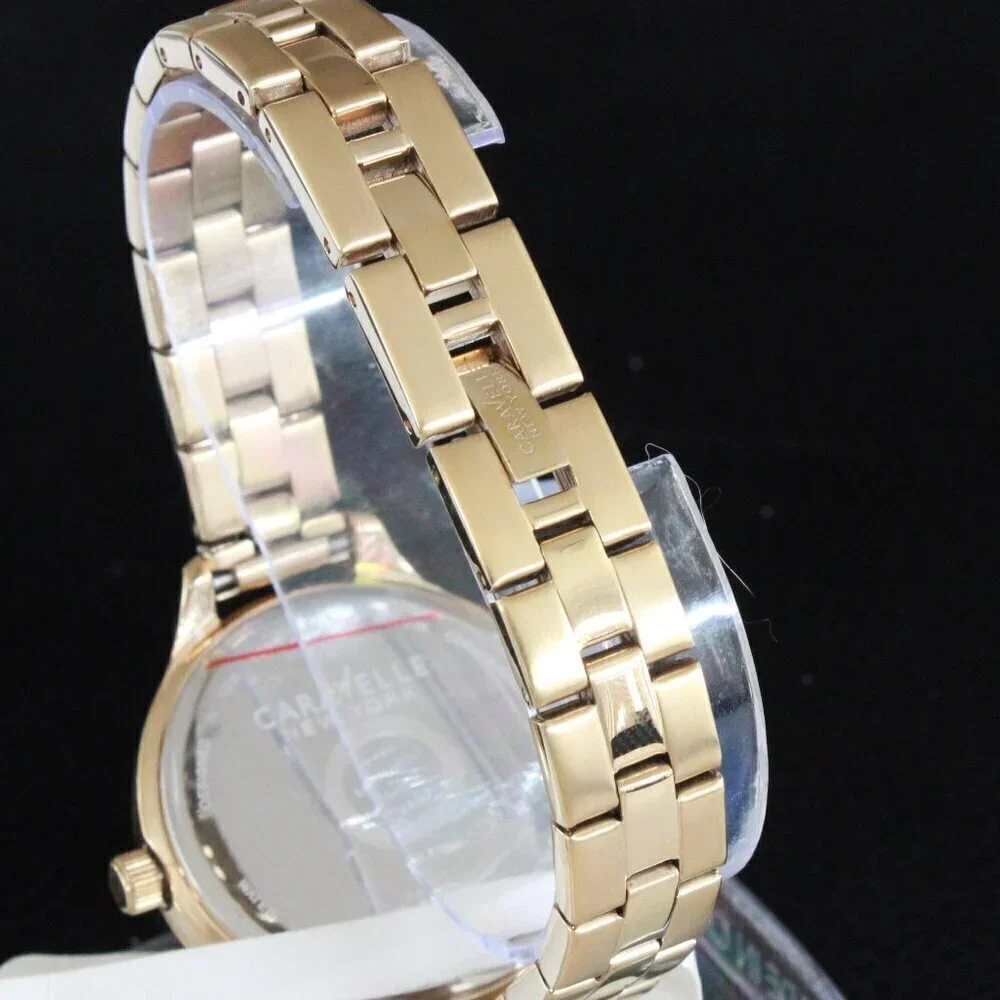 Caravelle New York Ladies Casual Watch Swarovski Crystal Bezel Gold Tone 37mm